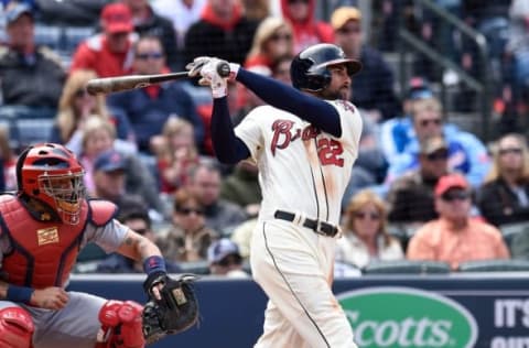 Apr 10, 2016; Atlanta, GA, USA; Atlanta Braves right fielder Nick Markakis (22) hits a ground rule double to drive in a run against the St. Louis Cardinals during the sixth inning at Turner Field. Mandatory Credit: Dale Zanine-USA TODAY Sports