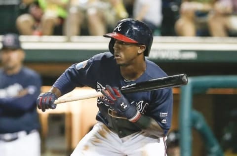 Mar 12, 2016; Lake Buena Vista, FL, USA; Atlanta Braves shortstop Ozzie Albies (87) tries to bunt during the third inning of a spring training baseball game against the Washington Nationals at Champion Stadium. Mandatory Credit: Reinhold Matay-USA TODAY Sports