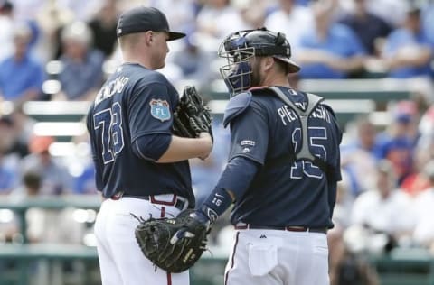 Mar 8, 2016; Lake Buena Vista, FL, USA; Atlanta Braves starting pitcher Sean Newcomb (78) and catcher A.J. Pierzynski (15) talk at the mound during the fourth inning of a spring training baseball game against the New York Mets at Champion Stadium. The Braves won 5-4. Mandatory Credit: Reinhold Matay-USA TODAY Sports