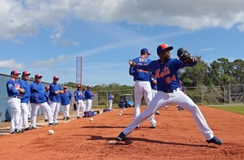 Feb 22, 2016; Port St. Lucie, FL, USA; New York Mets relief pitcher Akeel Morris (64) throws in the bullpen during spring training work out drills at Tradition Field. Mandatory Credit: Steve Mitchell-USA TODAY Sports