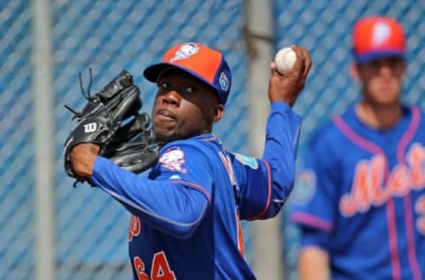 Feb 22, 2016; Port St. Lucie, FL, USA; New York Mets relief pitcher Akeel Morris (64) throws during spring training work out drills at Tradition Field. Mandatory Credit: Steve Mitchell-USA TODAY Sports