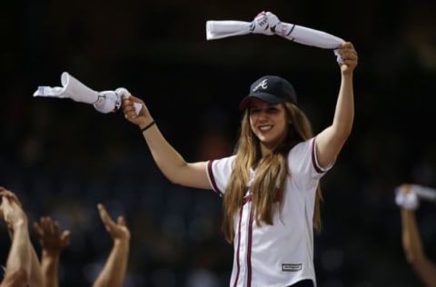 May 26, 2016; Atlanta, GA, USA; An Atlanta Braves Tomahawk Team member passes out t-shirts to the fan from against the Milwaukee Brewers in the seventh inning at Turner Field. Mandatory Credit: Brett Davis-USA TODAY Sports