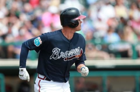 Mar 18, 2016; Lake Buena Vista, FL, USA; Atlanta Braves shortstop Reid Brignac (4) hits a RBI double during the fourth inning against the Miami Marlins at Champion Stadium. Mandatory Credit: Kim Klement-USA TODAY Sports