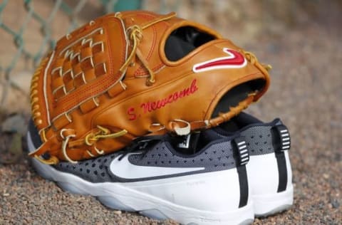 Feb 29, 2016; Lake Buena Vista, FL, USA; Atlanta Braves pitcher Sean Newcomb (not picture) shoes and glove rest on the ground during spring training workouts at ESPN