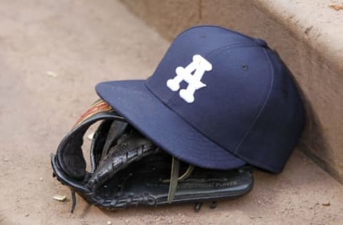 Jun 25, 2016; Atlanta, GA, USA; An Atlanta Braves throwback hat is seen in the dugout during a game against the New York Mets in the fifth inning at Turner Field. Mandatory Credit: Brett Davis-USA TODAY Sports