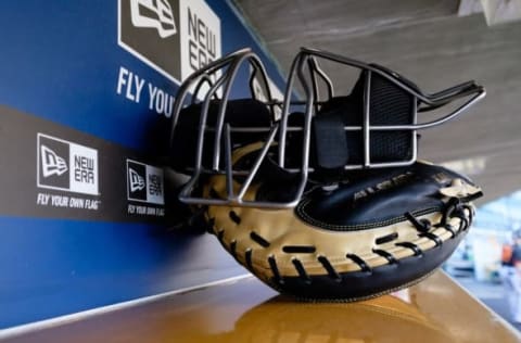 Sep 7, 2014; Detroit, MI, USA; Catchers mask and glove sits in dugout before the game between the Detroit Tigers and the San Francisco Giants at Comerica Park. Mandatory Credit: Rick Osentoski-USA TODAY Sports