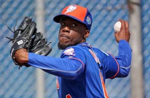 Feb 22, 2016; Port St. Lucie, FL, USA; New York Mets relief pitcher Akeel Morris (64) throws during spring training work out drills at Tradition Field. Mandatory Credit: Steve Mitchell-USA TODAY Sports