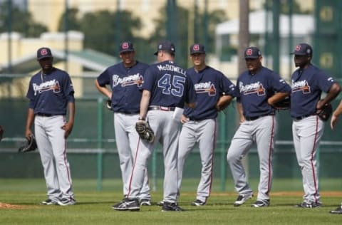 Feb 29, 2016; Lake Buena Vista, FL, USA; Atlanta Braves pitchers listen to coach Atlanta Braves pitching coach Roger McDowell (45) during spring training workouts at ESPN