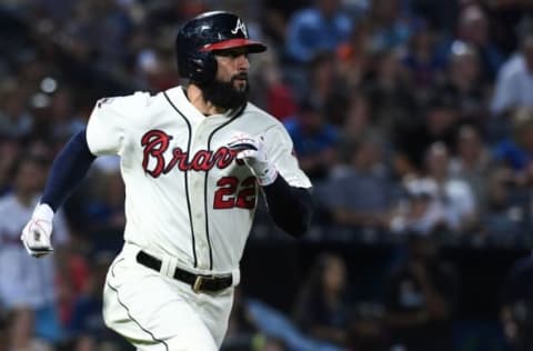 Sep 10, 2016; Atlanta, GA, USA; Atlanta Braves right fielder Nick Markakis (22) hits a home run during the fourth inning against the New York Mets at Turner Field. Mandatory Credit: Shanna Lockwood-USA TODAY Sports