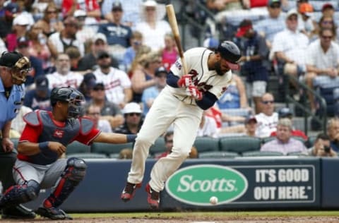 Sep 17, 2016; Atlanta, GA, USA; Atlanta Braves left fielder Matt Kemp (27) is hit by a pitch against the Washington Nationals in the fifth inning at Turner Field. Mandatory Credit: Brett Davis-USA TODAY Sports