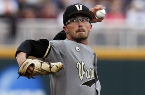 Jun 23, 2015; Omaha, NE, USA; Vanderbilt Commodores pitcher Philip Pfeifer (22) throws during the first inning against the Virginia Cavaliers in game two of the College World Series Finals at TD Ameritrade Park. Mandatory Credit: Bruce Thorson-USA TODAY Sports