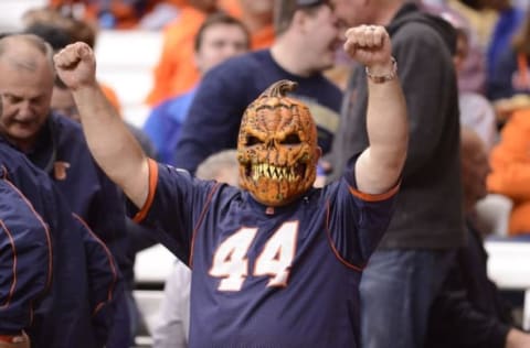 Oct 24, 2015; Syracuse, NY, USA; A Syracuse Orange fan wears a Halloween mask during a game between the Pittsburgh Panthers and the Syracuse Orange at the Carrier Dome. Pittsburgh won 23-20. Mandatory Credit: Mark Konezny-USA TODAY Sports