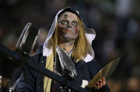 Oct 30, 2015; Logan, UT, USA; A member of the Utah State Aggies band dresses up as a zombie for Halloween during the game against the Wyoming Cowboys at Romney Stadium. The Aggies won 58-27. Mandatory Credit: Chris Nicoll-USA TODAY Sports