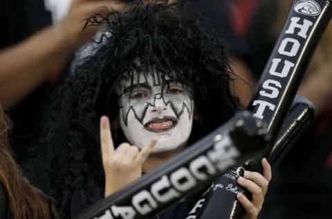 Oct 31, 2015; Houston, TX, USA; A fan dressed up for Halloween watches the Houston Cougars warm up before playing against the Vanderbilt Commodores at TDECU Stadium. Mandatory Credit: Thomas B. Shea-USA TODAY Sports