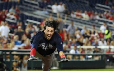 Sep 6, 2016; Washington, DC, USA; Atlanta Braves shortstop Dansby Swanson (2) dives home to score an inside the park home run against the Washington Nationals during the second inning at Nationals Park. Mandatory Credit: Brad Mills-USA TODAY Sports