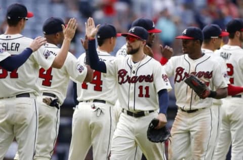 Sep 17, 2016; Atlanta, GA, USA; Atlanta Braves center fielder Ender Inciarte (11) and center fielder Mallex Smith (17) celebrate a victory with teammates against the Washington Nationals at Turner Field. The Braves defeated the Nationals 7-3. Mandatory Credit: Brett Davis-USA TODAY Sports