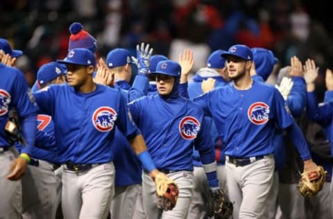 Oct 26, 2016; Cleveland, OH, USA; Chicago Cubs players from left Addison Russell , Javier Baez and Kris Bryant celebrate after defeating the Cleveland Indians in game two of the 2016 World Series at Progressive Field. Mandatory Credit: Charles LeClaire-USA TODAY Sports