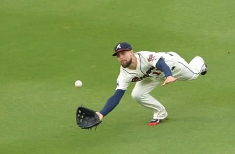 Sep 18, 2016; Atlanta, GA, USA; Atlanta Braves center fielder Ender Inciarte (11) tries to make a diving catch on a ball hit by Washington Nationals right fielder Bryce Harper (34) (not shown) during the sixth inning at Turner Field. Mandatory Credit: Dale Zanine-USA TODAY Sports