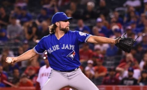 Sep 16, 2016; Anaheim, CA, USA; Toronto Blue Jays starting pitcher R.A. Dickey (43) pitches in the first inning of the game against the Los Angeles Angels at Angel Stadium of Anaheim. Mandatory Credit: Jayne Kamin-Oncea-USA TODAY Sports