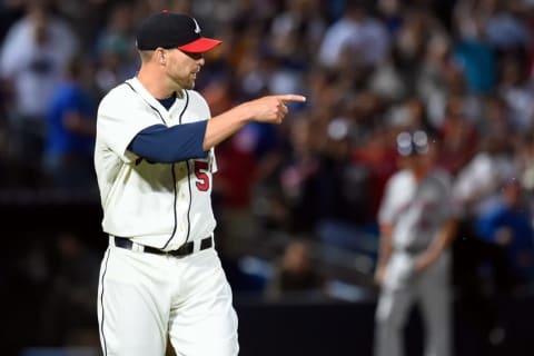 Apr 11, 2015; Atlanta, GA, USA; Atlanta Braves relief pitcher Jim Johnson (53) points to shortstop Andrelton Simmons (19) (not shown) after the last out against the New York Mets during the ninth inning at Turner Field. The Braves defeated the Mets 5-3. Mandatory Credit: Dale Zanine-USA TODAY Sports