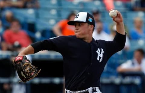 Mar 7, 2016; Tampa, FL, USA; New York Yankees relief pitcher Jacob Lindgren (65) pitches against the Houston Astros during the ninth inning at George M. Steinbrenner Field. Mandatory Credit: Butch Dill-USA TODAY Sports