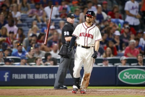 Jun 25, 2016; Atlanta, GA, USA; Atlanta Braves center fielder Ender Inciarte (11) reacts after a strikeout against the New York Mets in front of umpire Ryan Blakney (36) in the eighth inning at Turner Field. Mandatory Credit: Brett Davis-USA TODAY Sports