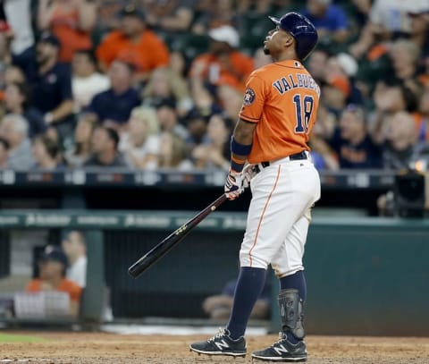 Jul 8, 2016; Houston, TX, USA; Houston Astros third baseman Luis Valbuena (18) hits a three run game winning home run against the Oakland Athletics in the ninth inning at Minute Maid Park. Astros won 10 to 9. Mandatory Credit: Thomas B. Shea-USA TODAY Sports