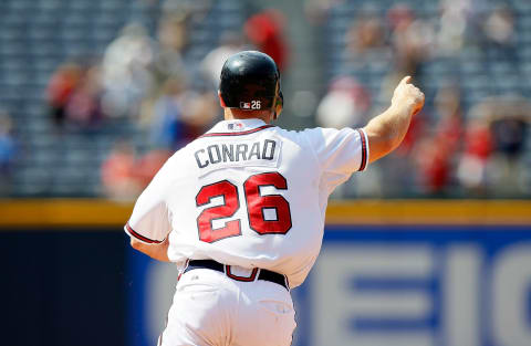 Atlanta Braves Brooks Conrad reacts after hitting that grand slam. (Photo by Kevin C. Cox/Getty Images)