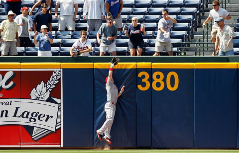 The homer by Atlanta Braves Brooks Conrad. Oh, how close it was. (Photo by Kevin C. Cox/Getty Images)