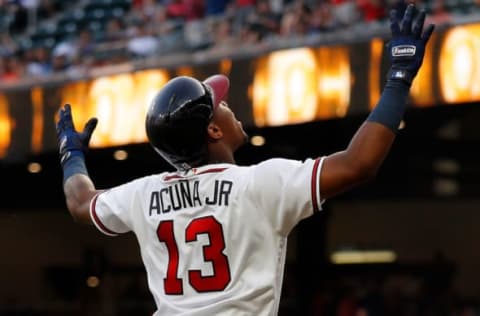 ATLANTA, GA – AUGUST 13: Ronald Acuna Jr. #13 of the Atlanta Braves reacts after hitting a solo homer to lead off game two of a doubleheader against the Miami Marlins at SunTrust Park on August 13, 2018 in Atlanta, Georgia. (Photo by Kevin C. Cox/Getty Images)