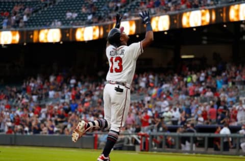 ATLANTA, GA – AUGUST 13: Ronald Acuna Jr. #13 of the Atlanta Braves reacts after hitting a solo homer to lead off game two of a doubleheader against the Miami Marlins at SunTrust Park on August 13, 2018 in Atlanta, Georgia. (Photo by Kevin C. Cox/Getty Images)