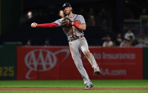 PITTSBURGH, PA – AUGUST 22: Dansby Swanson #7 of the Atlanta Braves throws to first base to force out Corey Dickerson #12 of the Pittsburgh Pirates in the ninth inning during the game at PNC Park on August 22, 2018 in Pittsburgh, Pennsylvania. (Photo by Justin Berl/Getty Images)