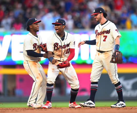 ATLANTA, GA – SEPTEMBER 2: Ozzie Albies #1, Ronald Acuna, Jr. #13, and Dansby Swanson #7 of the Atlanta Braves celebrate after the game against the Pittsburgh Pirates at SunTrust Park on September 2, 2018 in Atlanta, Georgia. (Photo by Scott Cunningham/Getty Images)