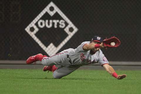 PHILADELPHIA, PA – SEPTEMBER 12: Adam Eaton #2 of the Washington Nationals makes a diving catch on a ball it by Odubel Herrera #37 of the Philadelphia Phillies (not pictured) in the bottom of the seventh inning at Citizens Bank Park on September 12, 2018 in Philadelphia, Pennsylvania. The Nationals defeated the Phillies 5-1. (Photo by Mitchell Leff/Getty Images)