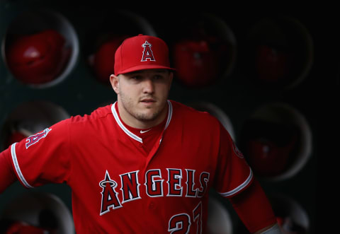 OAKLAND, CA – SEPTEMBER 18: Mike Trout #27 of the Los Angeles Angels stands in the dugout before their game against the Oakland Athletics at Oakland Alameda Coliseum on September 18, 2018 in Oakland, California. (Photo by Ezra Shaw/Getty Images)