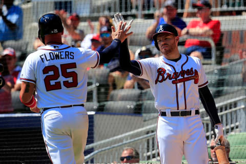 ATLANTA, GA – SEPTEMBER 19: Tyler Flowers #25 celebrates scoring on a wild pitch with Freddie Freeman #5 of the Atlanta Braves during the fifth inning against the St. Louis Cardinals at SunTrust Park on September 19, 2018 in Atlanta, Georgia. (Photo by Daniel Shirey/Getty Images)