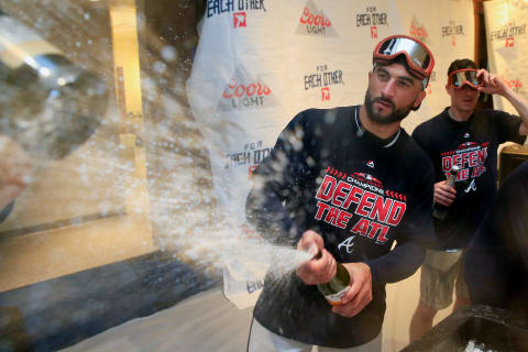 ATLANTA, GA – SEPTEMBER 22: Nick Markakis #22 of the Atlanta Braves celebrates with champagne after clinching the NL East Division against the Philadelphia Phillies at SunTrust Park on September 22, 2018 in Atlanta, Georgia. (Photo by Daniel Shirey/Getty Images)