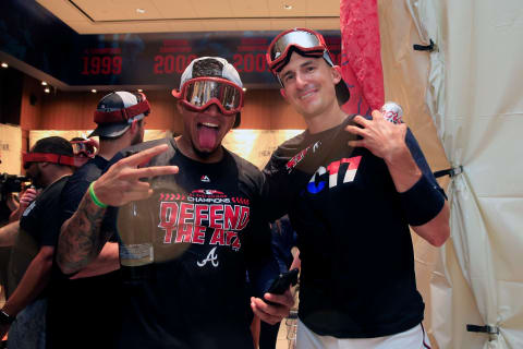 ATLANTA, GA – SEPTEMBER 22: Johan Cammargo #17 and Ryan Flahherty #27 of the Atlanta Braves celebrate after clinching the NL East Division against the Philadelphia Phillies at SunTrust Park on September 22, 2018 in Atlanta, Georgia. (Photo by Daniel Shirey/Getty Images)