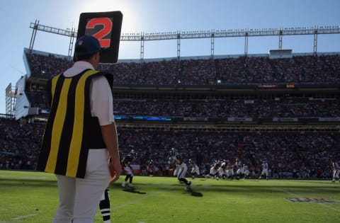 DENVER – SEPTEMBER 19: A member of the chain gang holds the down marker as the Denver Broncos host the Seattle Seahawks at INVESCO Field at Mile High on September 19, 2010 in Denver, Colorado. The Broncos defeated the Seahawks 31-14. (Photo by Doug Pensinger/Getty Images)