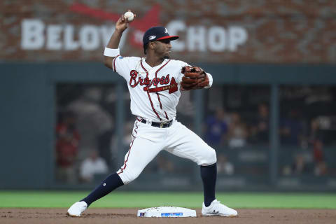 ATLANTA, GA – OCTOBER 07: Ozzie Albies #1 of the Atlanta Braves throws to first base for a double play in the first inning against the Los Angeles Dodgers during Game Three of the National League Division Series at SunTrust Park on October 7, 2018 in Atlanta, Georgia. (Photo by Rob Carr/Getty Images)