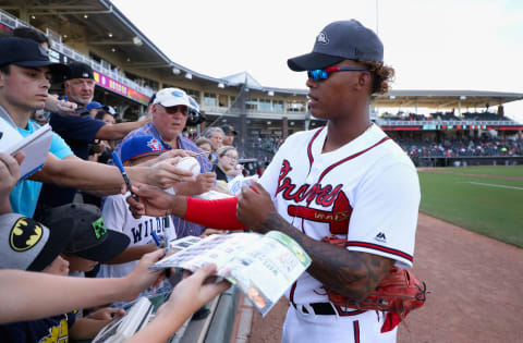 SURPRISE, AZ – NOVEMBER 03: AFL West All-Star, Cristian Pache #27 of the Atlanta Braves signs autographs before the Arizona Fall League All Star Game at Surprise Stadium on November 3, 2018 in Surprise, Arizona. (Photo by Christian Petersen/Getty Images)