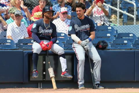 WEST PALM BEACH, FL – MARCH 13: Ozzie Albies #1 and Dansby Swanson #7 of the Atlanta Braves wait for a spring training baseball game against the Washington Nationals to begin at Fitteam Ballpark of the Palm Beaches on March 13, 2019 in West Palm Beach, Florida. The Nationals defeated the Braves 8-4. (Photo by Rich Schultz/Getty Images)
