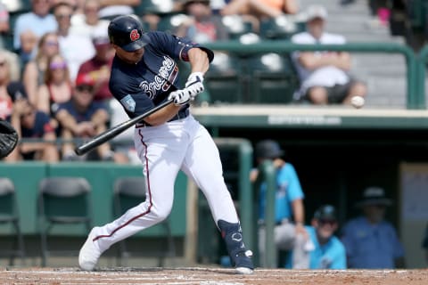 LAKE BUENA VISTA, FLORIDA – MARCH 03: Adam Duvall #23 of the Atlanta Braves hits a home run in the second inning against the Miami Marlins during the Grapefruit League spring training game at Champion Stadium on March 03, 2019 in Lake Buena Vista, Florida. (Photo by Dylan Buell/Getty Images)