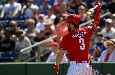 CLEARWATER, FLORIDA – MARCH 09: Bryce Harper #3 of the Philadelphia Phillies stretches in the first inning during a game against the Toronto Blue Jays on March 09, 2019 in Clearwater, Florida. (Photo by Mike Ehrmann/Getty Images)