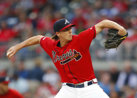 ATLANTA, GA – APRIL 12: Kyle  Wright #30 of the Atlanta Braves delivers in the first inning of an MLB game against the New York Mets at SunTrust Park on April 12, 2019 in Atlanta, Georgia. (Photo by Todd Kirkland/Getty Images)