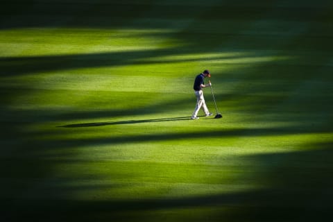 ATLANTA, GA – APRIL 13: A grounds crewman prepares the field for an Atlanta Braves and New York Mets baseball game at SunTrust Park on April 13, 2019 in Atlanta, Georgia. (Photo by John Amis/Getty Images)