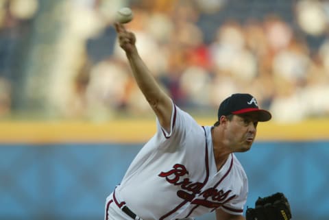 ATLANTA – JULY 17: Starting Pitcher Greg Maddux #31 of the Atlanta Braves throws the ball against the Florida Marlins during the game on July 17, 2002 at Turner Field in Atlanta, Georgia. The Braves shutout the Marlins 10-0. (Photo by Jamie Squire/Getty Images)