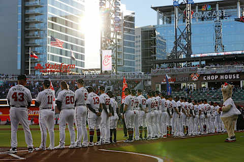 ATLANTA, GEORGIA – APRIL 01: The Atlanta Braves stand prior to the National Anthem before facing the Chicago Cubs April 01, 2019 in Atlanta, Georgia. (Photo by Kevin C. Cox/Getty Images)