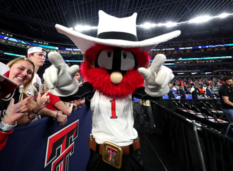 MINNEAPOLIS, MINNESOTA – APRIL 08: The Texas Tech Red Raiders mascot poses for a photo with fans prior to the 2019 NCAA men’s Final Four National Championship game between the Virginia Cavaliers and the Texas Tech Red Raiders at U.S. Bank Stadium on April 08, 2019 in Minneapolis, Minnesota. (Photo by Tom Pennington/Getty Images)