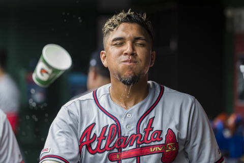 WASHINGTON, DC – JULY 31: Johan  Camargo #17 of the Atlanta Braves puts water on his face during the third inning against the Washington Nationals at Nationals Park on July 31, 2019 in Washington, DC. (Photo by Scott Taetsch/Getty Images)